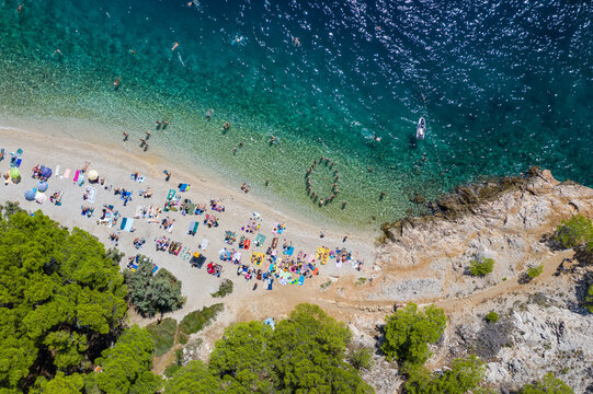 View from the cliff to the beautiful Nugal beach near the town of Makarska, Dalmatia, Croatia. Makarska Riviera, famous landmark and tourist destination in Europe