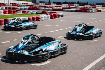 Machine kart before the start. Car kart crossing the line. Go kart speed rive outdoor race,...