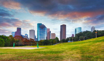 Houston skyline in sunny day from park grass of Texas USA - 747917080