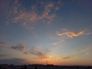 sunset in the sky with clouds