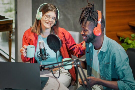 Podcast Hosts Sharing a Laugh