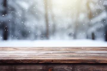 Foto op Canvas Empty old Wooden table in front of winter snowstorm landscape blurred background сreated with Generative Ai © Andrii Yablonskyi