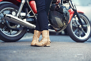 Legs, road and person with a motorcycle for urban journey and commute in Prague, Europe. Riding,...