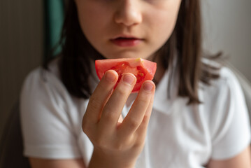 Child Eating Tomato: Close-Up of Mouth