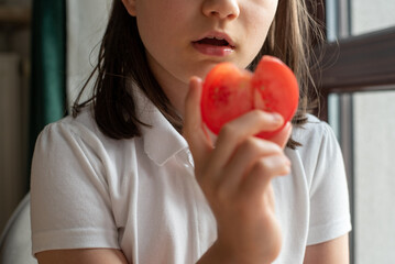 Child Eating Tomato: Close-Up of Mouth