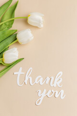 Gratitude Expressed with White Tulips and Thank You Note