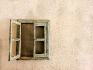 Empty wall with Vintage window Detail of house exterior wall. copy Space.