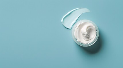 Blue background plain cream white cream skin care products cosmetics