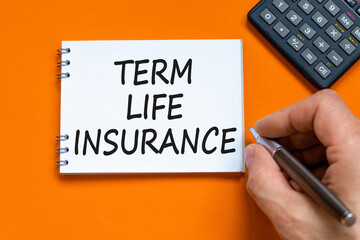 Term life insurance symbol. Concept words Term life insurance on beautiful white note. Beautiful...