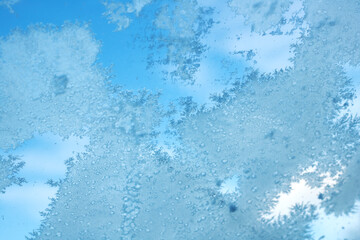 Close Up of Window With Snow Flakes