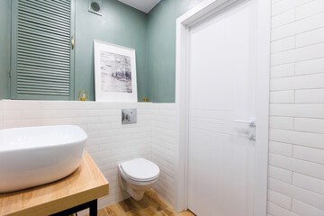 modern bathroom room with toilet and washing machine