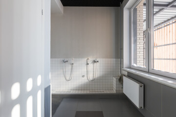modern bathroom room with toilet and washing machine