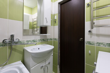 modern bathroom room with toilet and washing machine