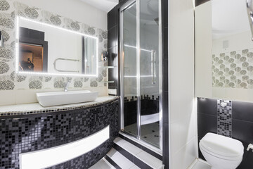 modern bathroom room with toilet and washing machine