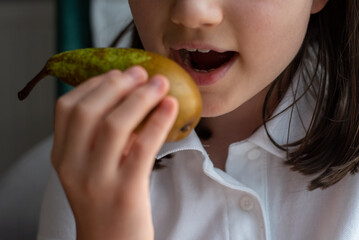 Girl Eating Pear: Close-Up