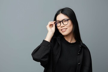 Portrait woman background cute glasses beautiful studio fashion face smile asian student attractive business beauty