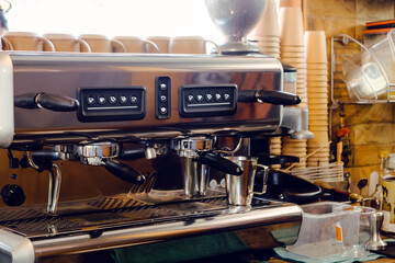 Professional coffee machine in coffeeshop. Professional coffee brewing concept.