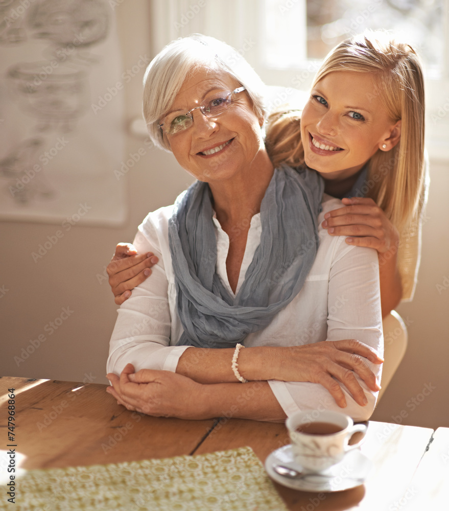 Poster Senior woman, daughter and portrait in lounge with tea for hug, visit and retirement. Elderly pensioner, grandmother and lady with smile in home for affection together with love and gesture of touch