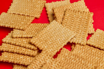 petit beurre biscuits, on a red background.