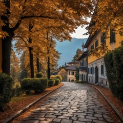 Cobbled path with autumn trees and historic homes
