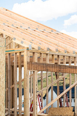 Suburban Single-Family House Construction: Framing Stage Progress
