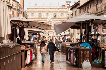 Piazza delle Erbe market - Tourism in the beautiful historical city center of Verona, Italy