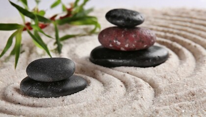 Obraz na płótnie Canvas Zen garden stones on white sand with pattern