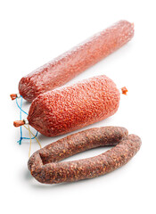 Smoked salami sausages isolated on white background.