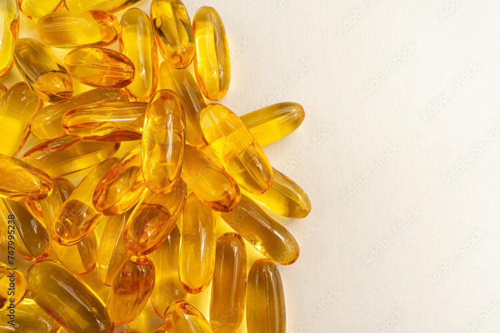 Wall mural omega 3 pills showcased, promoting a healthy lifestyle, against a white background. perfect for well