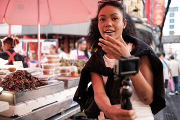 Asian woman enjoy travel in  downtown district