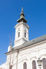 Fototapeta na wymiar Serbian Orthodox Church of St. George, Novi Sad, Serbia. Clear blue sky, daylight.