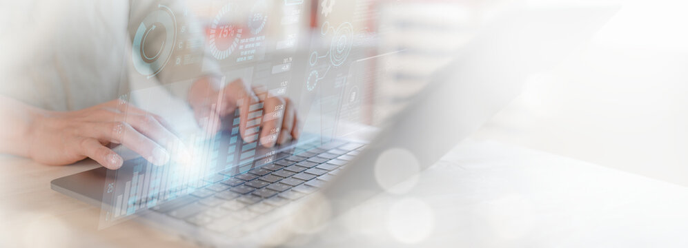 businessman on document planning the business plans and analyse  profitability of working companies with digital augmented virtual graphics for project manager working on laptop and update information