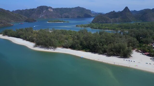 Island at sandy beach malysia Langkawi. Amazing aerial top view flight rotation to right drone
4k footage