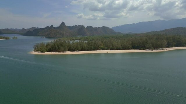 Island at sandy beach malysia Langkawi. Majestic aerial top view flight overflight flyover drone
4k footage