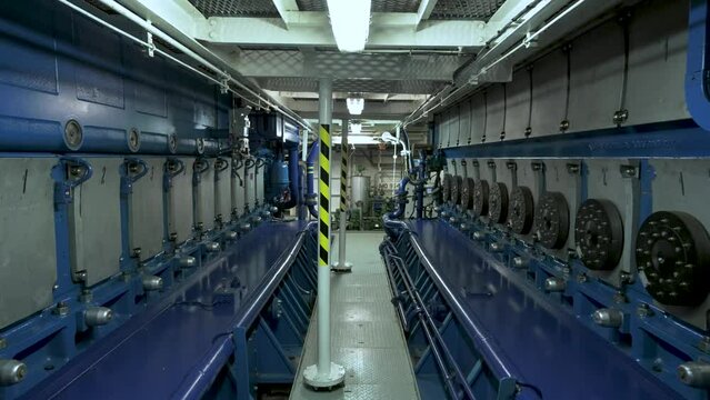 Diesels. Main engine in motor room of vessel. Power plant on the ship