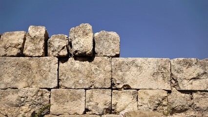 rustic stone wall against the sky