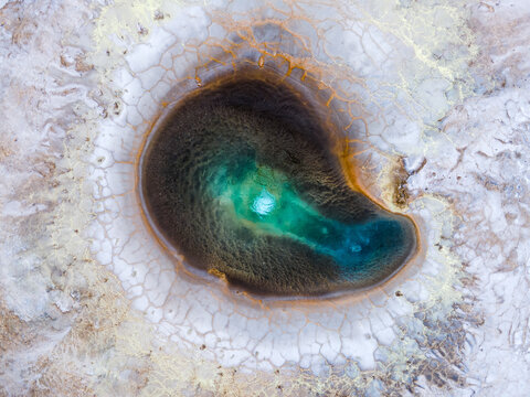 Detailed aerial view of the colourful geothermal hot pool in Hveravellir Nature Reserve in Highlands of Iceland