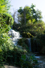 Krka National Park, Split, Croatia. Waterfall surrounded by green landscape and forest. Located in the region of Dalmatia. 