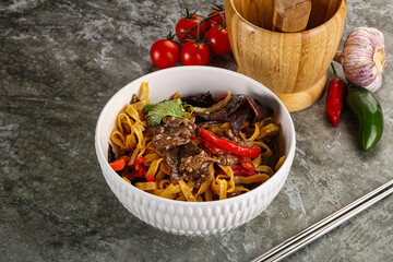 Asian wok with noodle, vegetables and beef