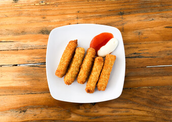 Roasted sausage with sauce on a plate