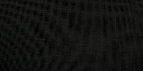 Black burlap texture background. Sacking and bagging pattern. Top view.