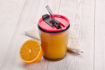 Sweet fresh orange juice in the glass