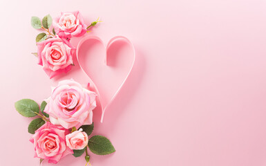 Love, Valentine and women's day concept made from pink paper hearts and roses on pastel background.