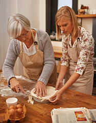 Grandmother, grandchild and together in kitchen to bake gluten free homemade pie, bonding and...