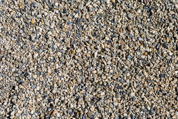 Pebble stone background, closeup top view of pebble stones, stone for garden walking path