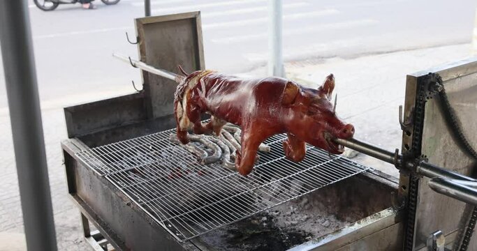 Roasted pig on a spit