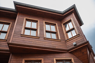 House made of laminated veneer lumber. Cottage made of laminated wood. Houses made of wood