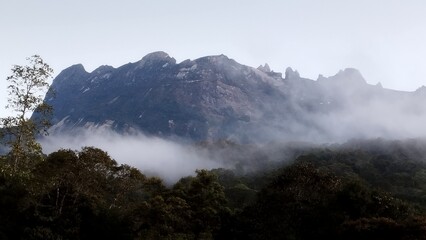 Mount Kinabalu, Sabah, Malaysia in a morning with fog, Kundasang