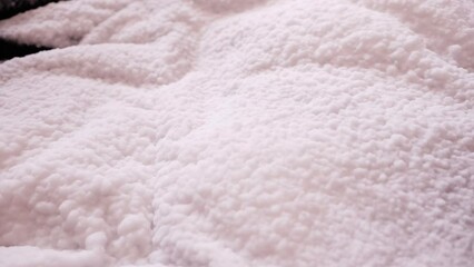 Transformation of black to white. Creative asset for video transition. Useful for   intro, outro or titles. Wavy polyester fabric