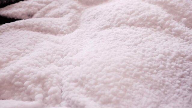 Transformation of black to white. Creative asset for video transition. Useful for   intro, outro or titles. Wavy polyester fabric